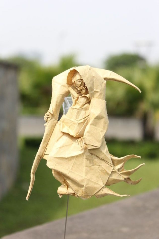 Illustration for article titled Papercraft Genius Creates Origami Dragons, Grim Reaper, and More